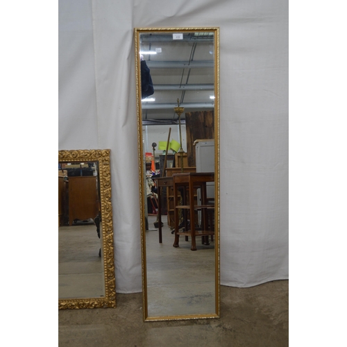 416 - Ornate rectangular gilt framed bevelled edge mirror - 52cm x 73cm together with a gilt framed mirror... 