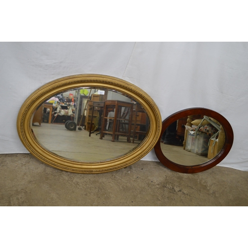 421 - Gilt framed oval bevelled edge mirror - 88cm x 65cm together with an oval mahogany framed mirror - 6... 