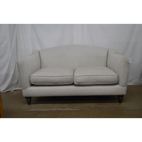 425 - John Lewis grey upholstered two seater settee with removable cushions, standing on turned feet