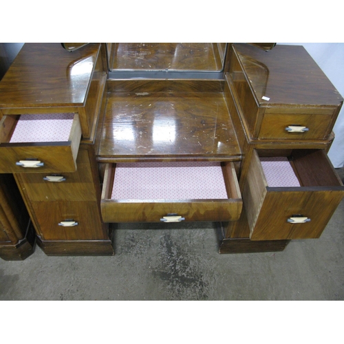 430 - 1930's walnut dressing table having a triple mirror over a central drawer flanked by three drawers, ... 