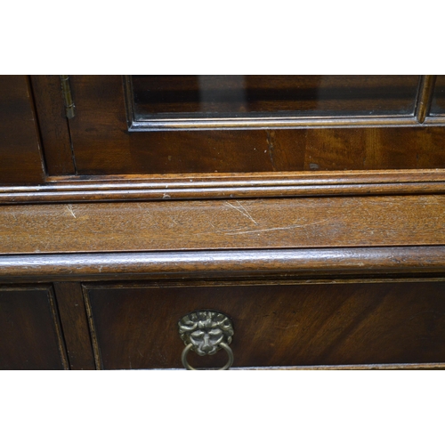 431 - Reproduction mahogany glazed bookcase, the top section having three astragal glazed doors opening to... 