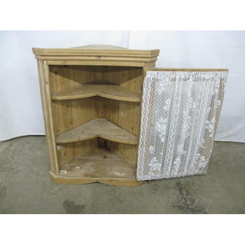 434 - Glazed pine corner wall hanging cabinet, the glazed door opening to two shaped shelves - 72cm x 40cm... 