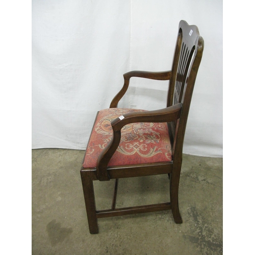 442 - Mahogany elbow chair having pierced splat back and padded upholstered seat, standing on square front... 