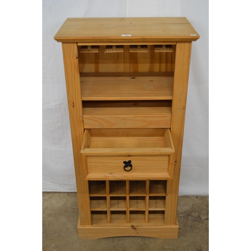 448 - Modern pine wine rack having a glasses rack over a single drawer with a sixteen bottle rack below, s... 