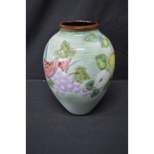 48 - Chelsea Pottery vase having glazed decoration of fruit - 27.5cm tall together with Carltonware cornu... 