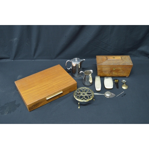 54 - Group of sundry items to include: mahogany tea caddy, cutlery canteen, brass trivet and silver- plat... 