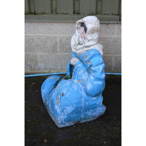 6 - Fiberglass statue of a seated lady in blue clothing with white head scarf - 95cm tall