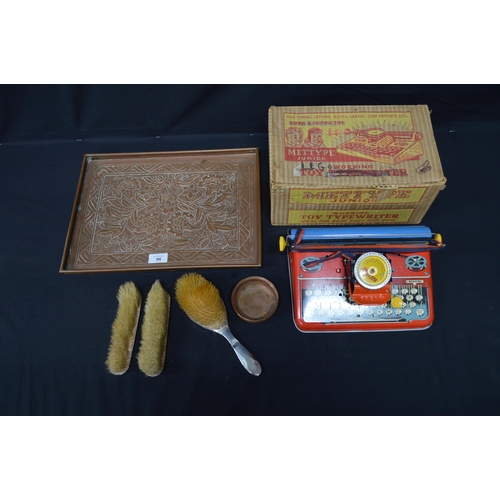 90 - Boxed Mettype Junior toy typewriter together with copper embossed serving tray, copper bowl and thre... 