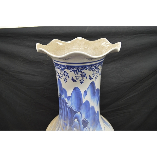 94 - Large late 20th century blue and white floor vase decorated with trees - 183cm tall