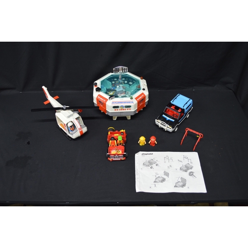 99 - Quantity of Playmobil to include: rescue helicopter, Jeep, truck, space station and figures