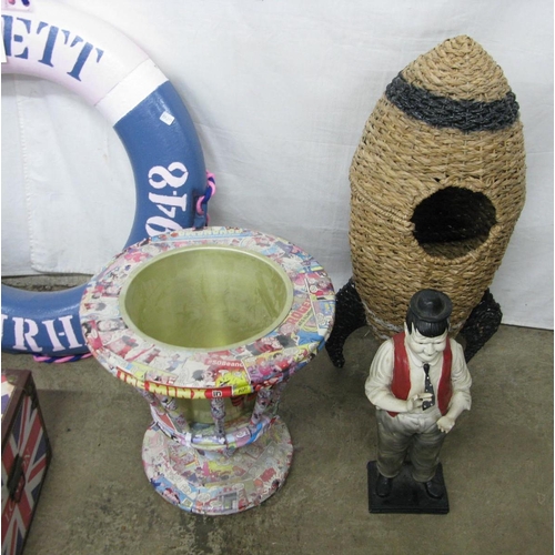 18 - Group of sundry items to comprise: painted Lifebuoy, two modern storage cases, wicker rocket basket,... 