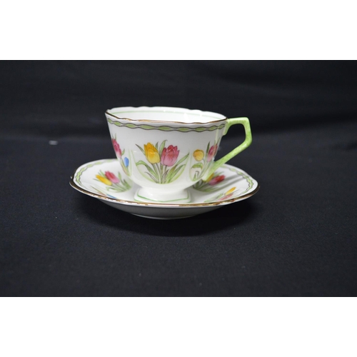 29 - Ansley bone china teaset having hand painted decoration of tulips and green & gilt borders to compri... 