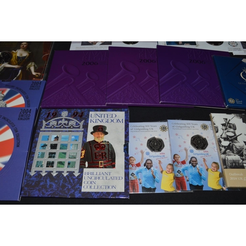 57 - Group of various Royal Mint Year, Proof and Brilliant uncirculated coin packs to include: £5, £2 coi... 