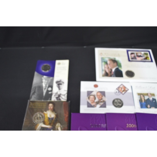 57 - Group of various Royal Mint Year, Proof and Brilliant uncirculated coin packs to include: £5, £2 coi... 