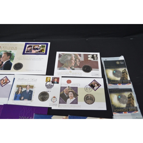 57 - Group of various Royal Mint Year, Proof and Brilliant uncirculated coin packs to include: £5, £2 coi... 