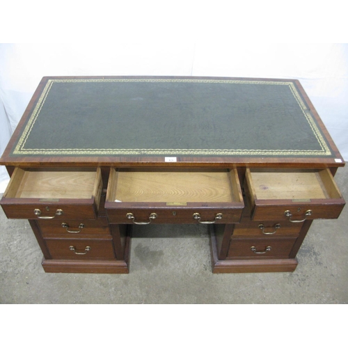 479 - Hampton & Sons twin pedestal desk having inset leather top over an arrangement of nine drawers, with... 