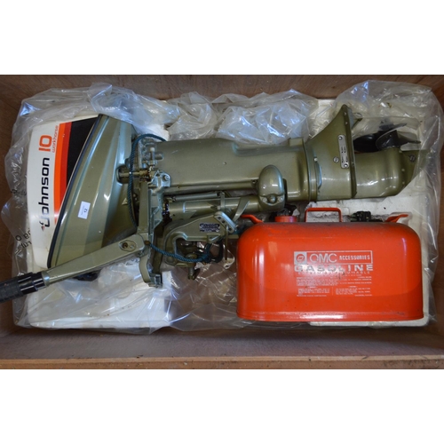 12 - Johnson 10 Workhorse outboard engine with two additional tanks and wooden transport crate (Sold as s... 