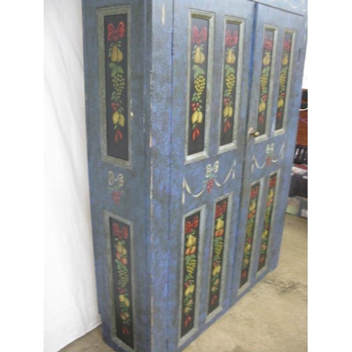 361 - Painted pine cupboard, the two panelled doors opening to six fixed shelves, the panels painted with ... 