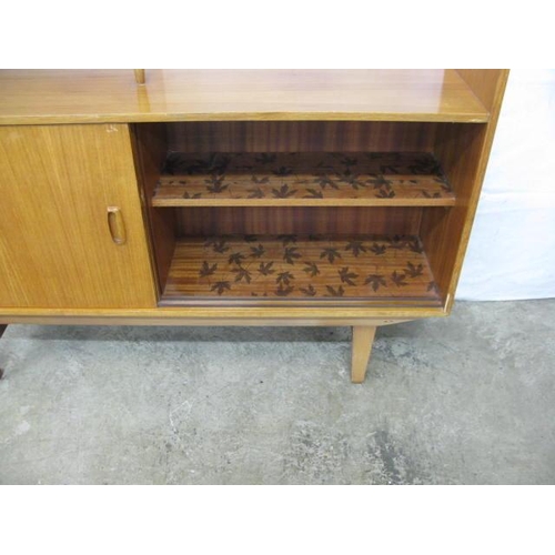 365 - Mid century teak room divider having a central shelf with two half shelves united by turned tapering... 