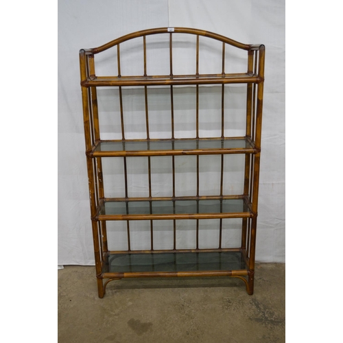 367 - Bamboo open bookshelves having an arched three quarter galleried top over four glass shelves, standi... 