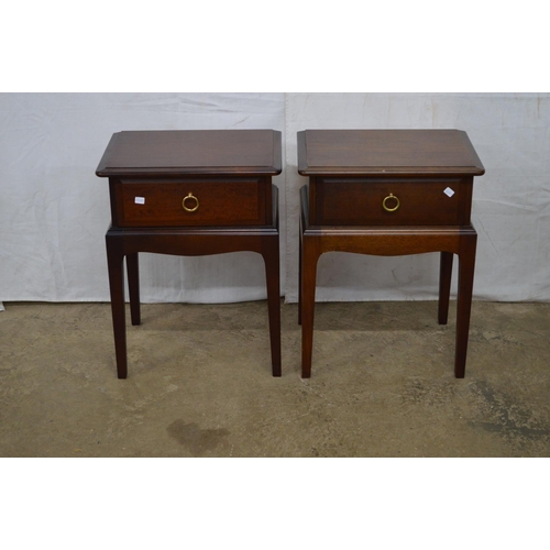 369 - Pair of Stag Minstrel bedside tables both having a single drawer, standing on square tapering legs -... 