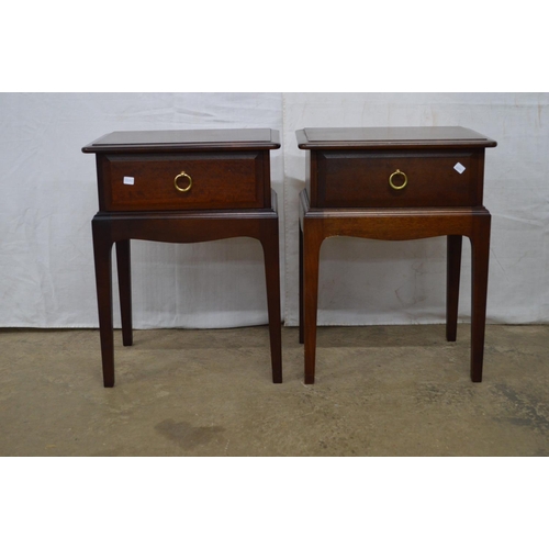 369 - Pair of Stag Minstrel bedside tables both having a single drawer, standing on square tapering legs -... 