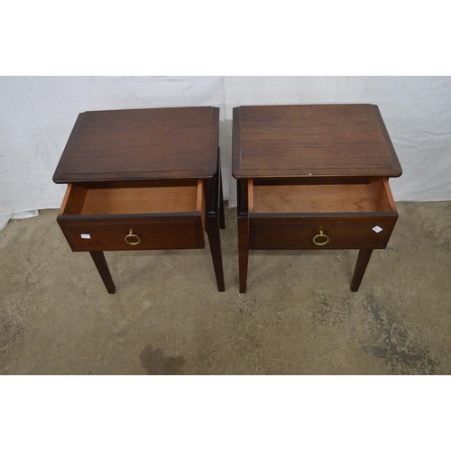 369 - Pair of Stag Minstrel bedside tables both having a single drawer, standing on square tapering legs -... 