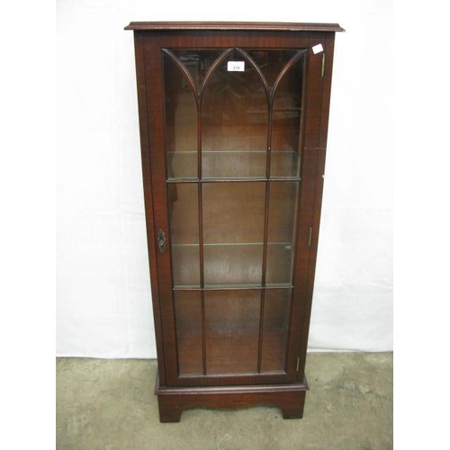 374 - Reproduction mahogany glazed display cabinet, the astragal glazed door opening to two glass shelves,... 