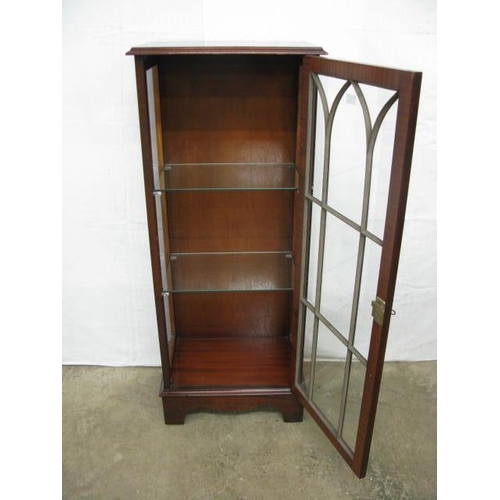 374 - Reproduction mahogany glazed display cabinet, the astragal glazed door opening to two glass shelves,... 