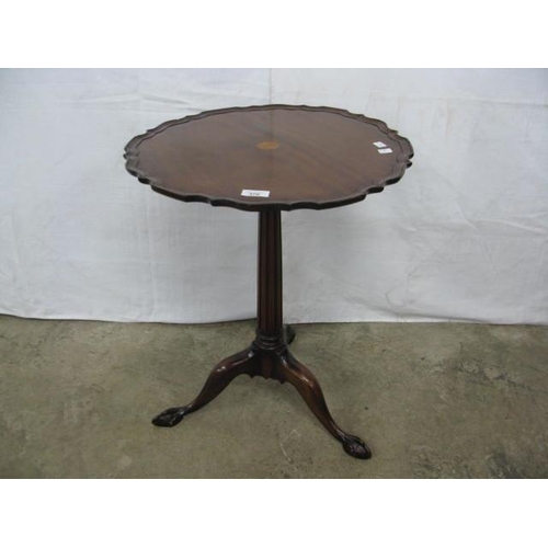 376 - Inlaid mahogany wine table, the pie crust top over a tapering fluted column, standing on splayed tri... 