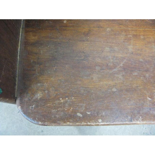 379 - Pine church pew having panelled back and solid seat, standing on shaped end supports - 98cm x 49cm x... 