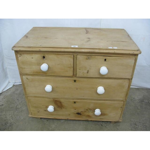 392 - Pine chest of two short over two long drawers, standing on block feet - 82cm x 46cm x 70cm tall