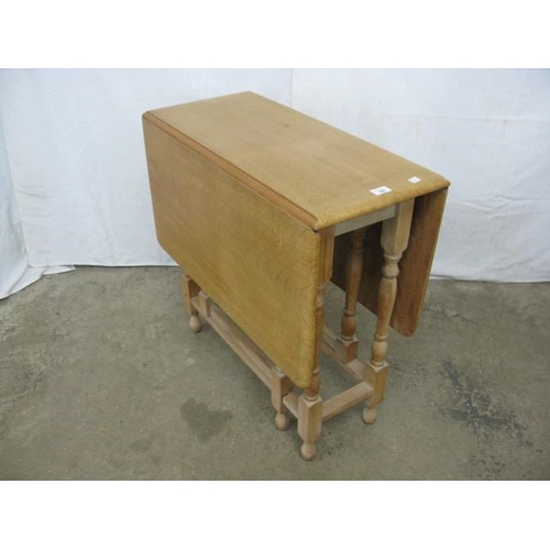 393 - Light oak top gateleg table, standing on turned legs with stretchers - 75cm x 36cm x 73cm tall close... 