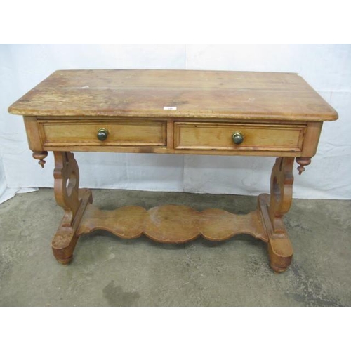 398 - Pine washstand/side table having two drawers over a shaped lower tier united by shaped pierced end s... 