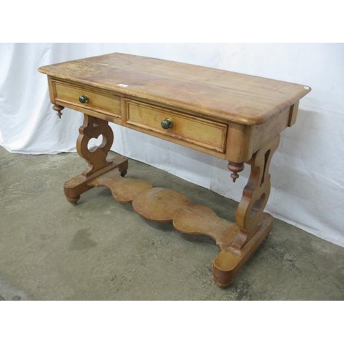 398 - Pine washstand/side table having two drawers over a shaped lower tier united by shaped pierced end s... 