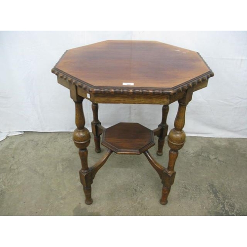 400 - Oak octagonal top centre table having an octagonal lower tier united by turned supports - 69cm x 67c... 