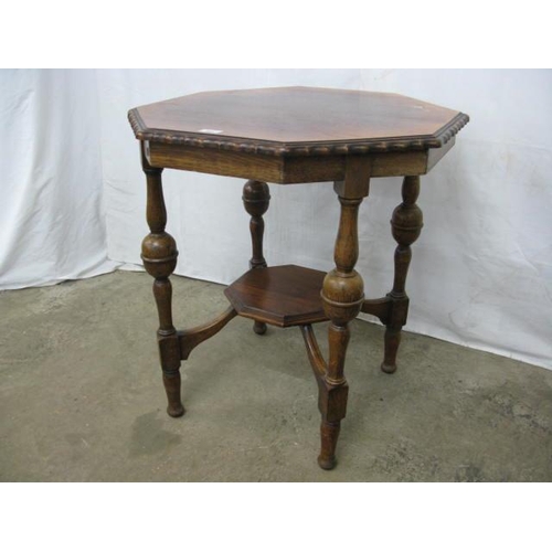 400 - Oak octagonal top centre table having an octagonal lower tier united by turned supports - 69cm x 67c... 