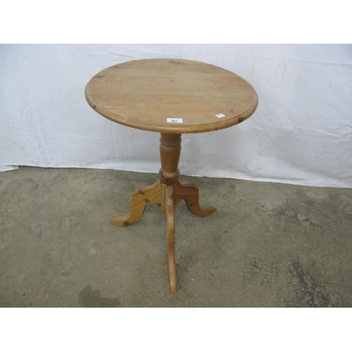 401 - Pine wine table the circular top over a turned column with splayed tripod supports - 52cm dia x 66cm... 