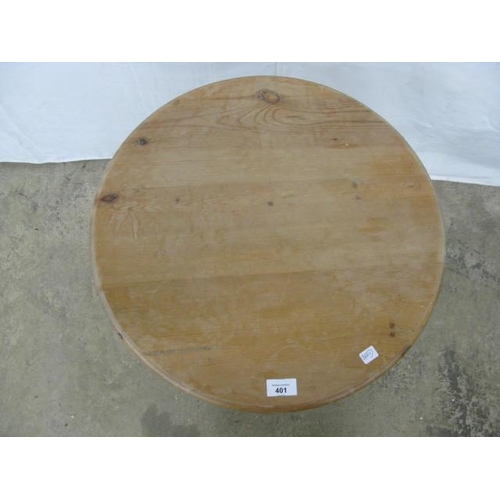 401 - Pine wine table the circular top over a turned column with splayed tripod supports - 52cm dia x 66cm... 