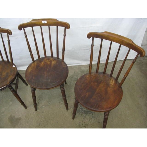 402 - Two pairs of penny seat kitchen chairs having stick backs, standing on turned legs with stretchers -... 