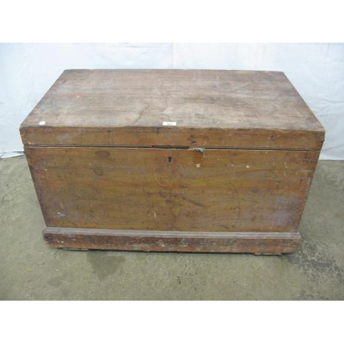 403 - Pine blanket box, the hinged lift top lid opening to a candle box and storage with iron carrying han... 