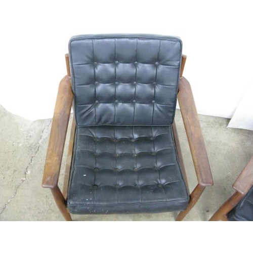 405 - Mid century Danish three piece suite in the manner of Arne Vodder having leather cushioned buttoned ... 