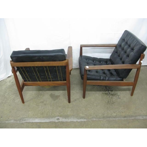 405 - Mid century Danish three piece suite in the manner of Arne Vodder having leather cushioned buttoned ... 