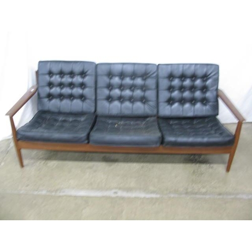 405 - Mid century Danish three piece suite in the manner of Arne Vodder having leather cushioned buttoned ... 