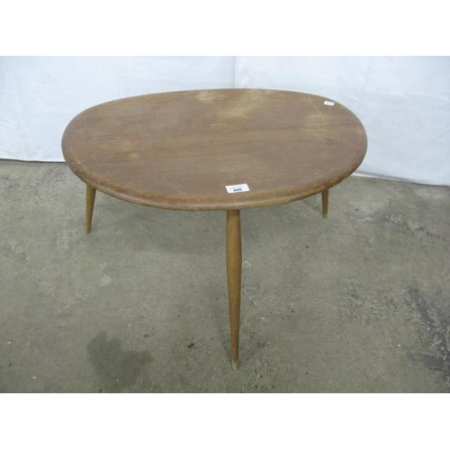 406 - Ercol elm and beech pebble table, the shaped top standing on angled tapering legs - 65cm x 45cm x 41... 