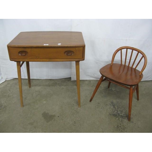 407 - Ercol beech and elm Model 437 desk/side table having a shaped rectangular top over a single drawer w... 