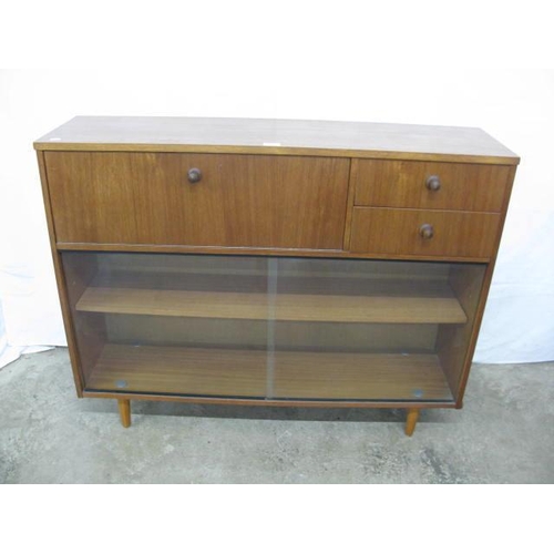 411 - Avalon teak glazed bureau bookcase having two drawers next to a fall front opening to four pigeon ho... 