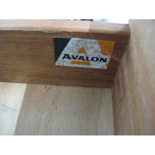 411 - Avalon teak glazed bureau bookcase having two drawers next to a fall front opening to four pigeon ho... 