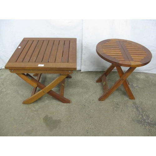 481 - Robert Dyas small square teak folding garden table having a slatted top, standing on splayed stretch... 