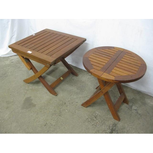 481 - Robert Dyas small square teak folding garden table having a slatted top, standing on splayed stretch... 